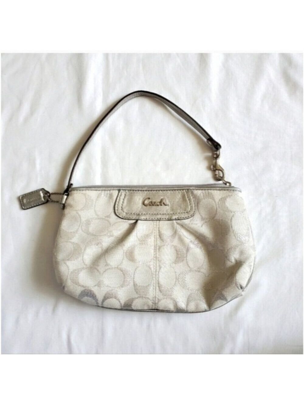 COACH Signature Monogram Metallic Canvas Wristlet